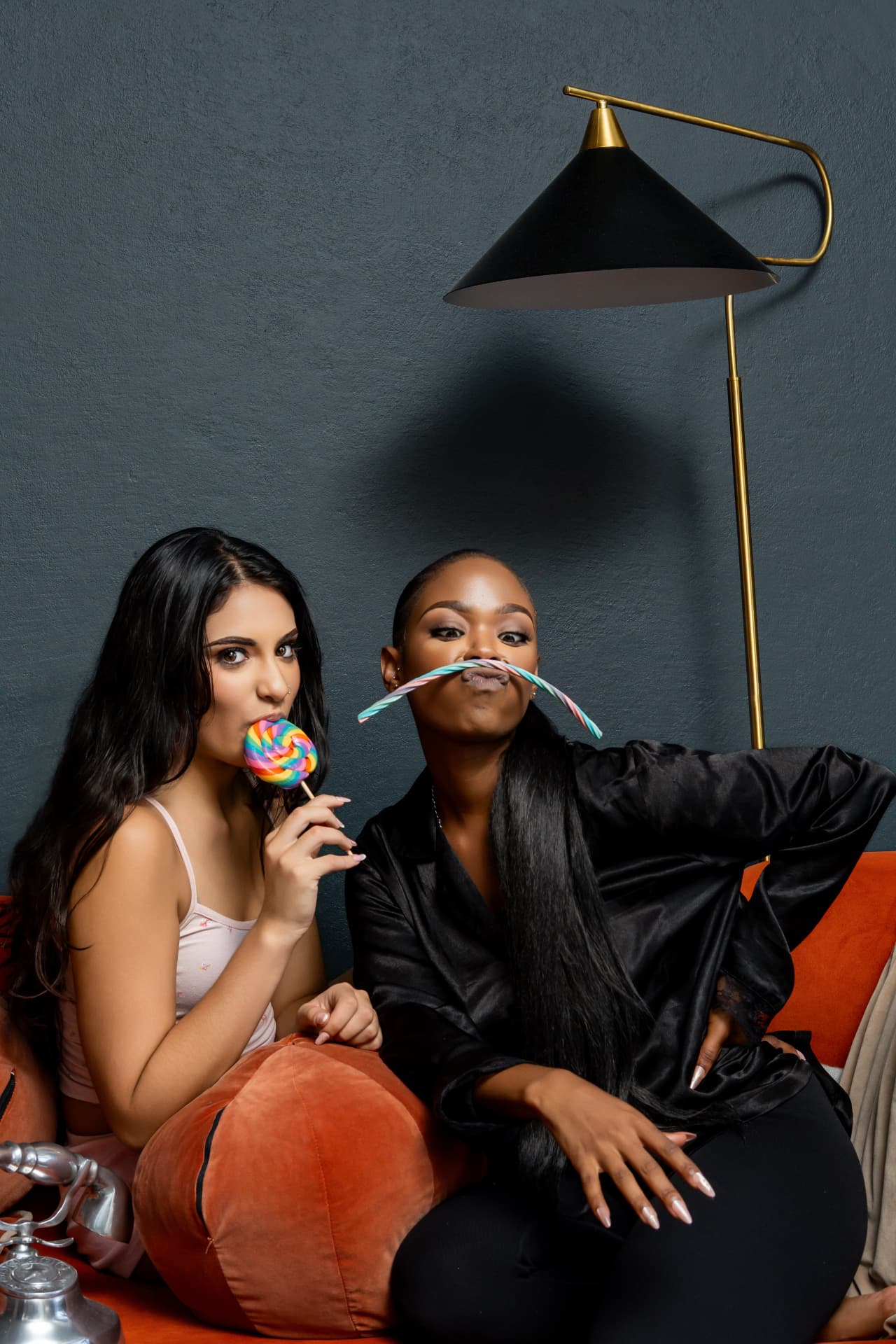 Two clients enjoying candy after their treatments